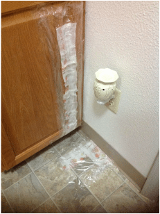 Rubbing alcohol method (I also used it on the wall.) This worked well on the wall...not so much on the cupboard and floor pictured.