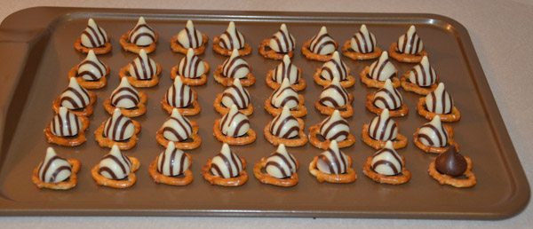 Top with striped Hershey's Kisses. (I tried regular ones, but the striped ones look and taste better).