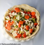 Chicken Pot Pie_chicken_prep1 Chicken and vegetables, after being boiled and drained. Place in bottom pie crust.