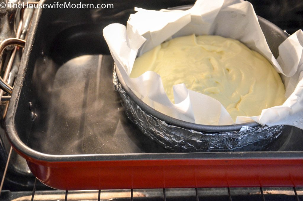 Pour the batter into the prepared pan. Set the pan into the roasting pan in the pre-heated oven. Use water bath.