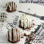 Luscious Devil's Food Cake in a (large) bite...covered in chocolate.