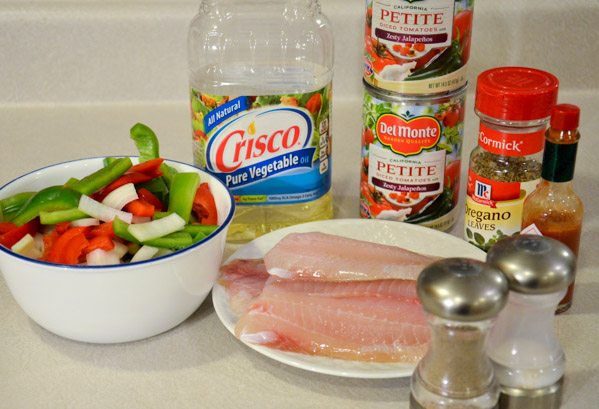 Ingredients: tilapia, red & green peppers, onions, diced tomatoes, & spices.