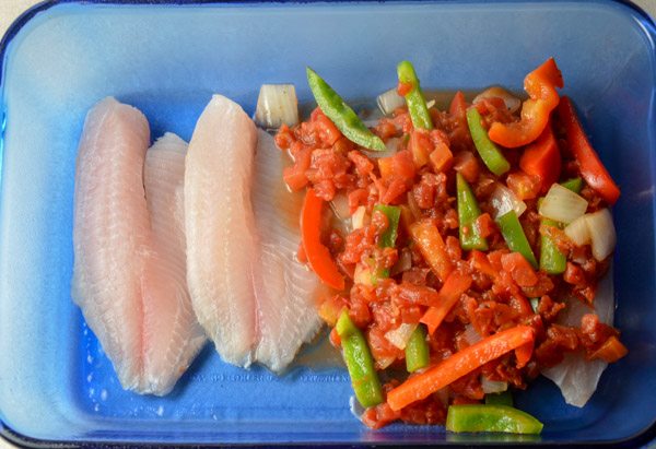 Place vegetable mixture over prepared fish.