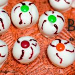 Irresistible Halloween Buck"eyes"- classic buckeyes with white chocolate and decorated just for Halloween.