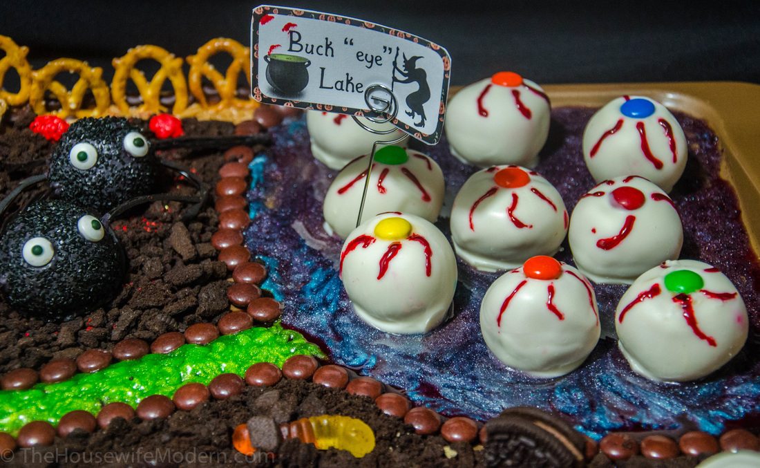 Irresistible Halloween Buck"eyes"- classic buckeyes with white chocolate and decorated just for Halloween.