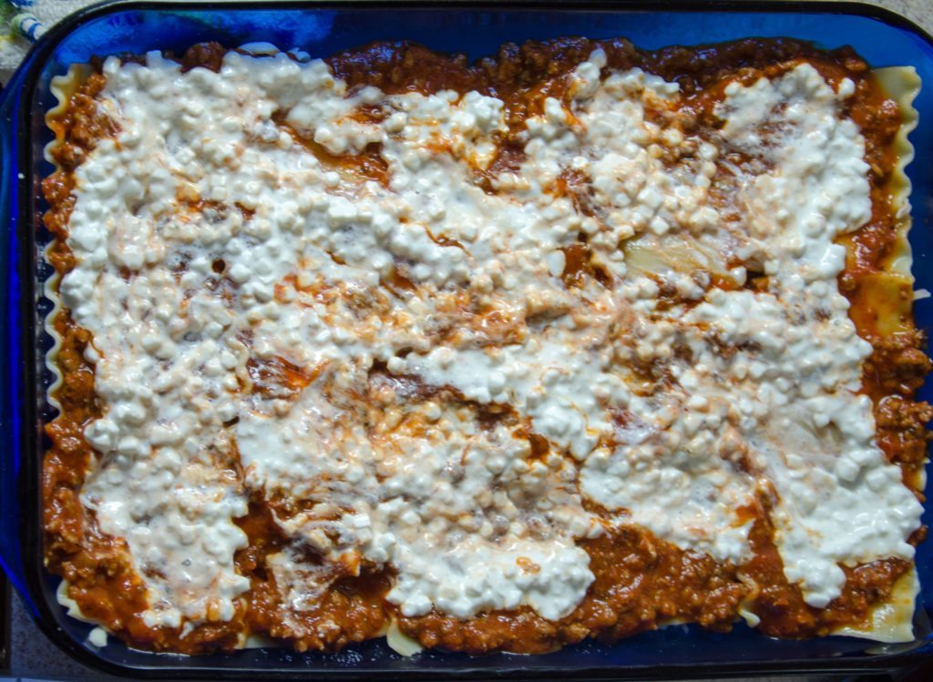 Spread 1/2 of cottage cheese.