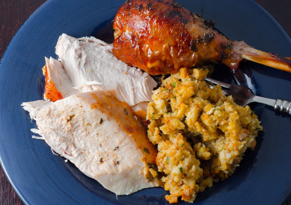 LR_Turkey, Cider Brined_Final overhead Apple Cider-Brined Turkey with Herb Butter: the moistest, most flavorful turkey you'll ever eat. Step-by-step pictures, instructions on how to truss a turkey.