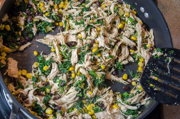 LR_White Chicken Enchiladas_prep-3 Mix in chicken, spinach, half of green chilis, and spices