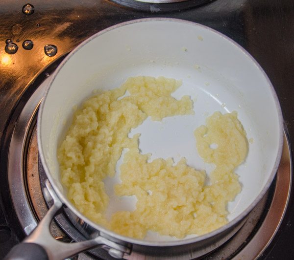 LR_White Chicken Enchiladas_prep-8 Add chicken broth 2-3 Tbsp. at a time. First addition will cause flour to chicken up completely.