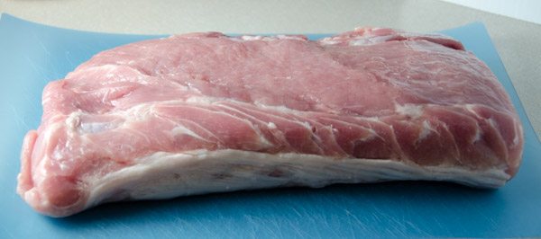 Tuscan-Style Pork Loin: tender, moist, & flavorful. Pork stuffed with cream cheese, bacon, pesto, roasted peppers, and more.