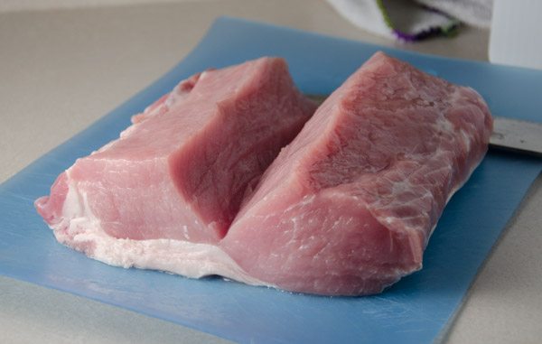 Tuscan-Style Pork Loin: tender, moist, & flavorful. Pork stuffed with cream cheese, bacon, pesto, roasted peppers, and more.