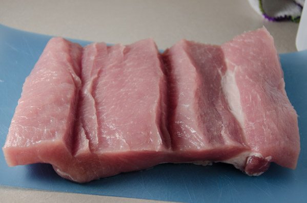 Tuscan-Style Pork Loin: tender, moist, & flavorful. Pork stuffed with cream cheese, bacon, pesto, roasted peppers, and more.