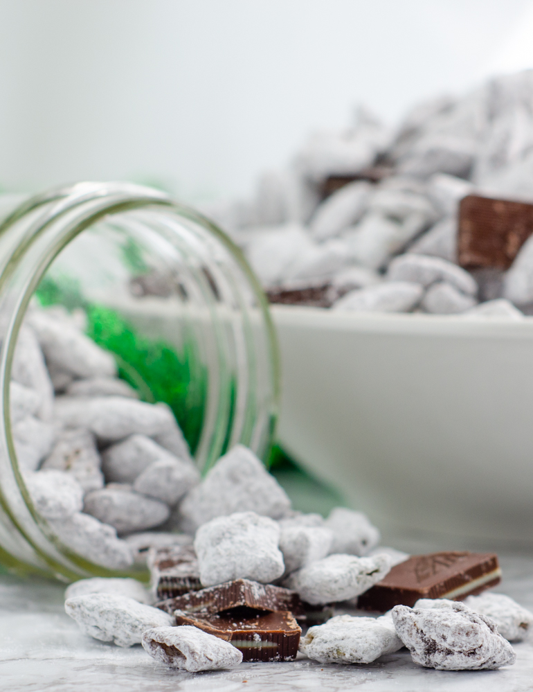 Andes Mint Muddy Buddies, Andes Mint Puppy Chow. Delicious mint chips and chocolate chips combine into puppy chow topped with Andes mints. Mint chocolate muddy buddies...a delicious and easy treat!