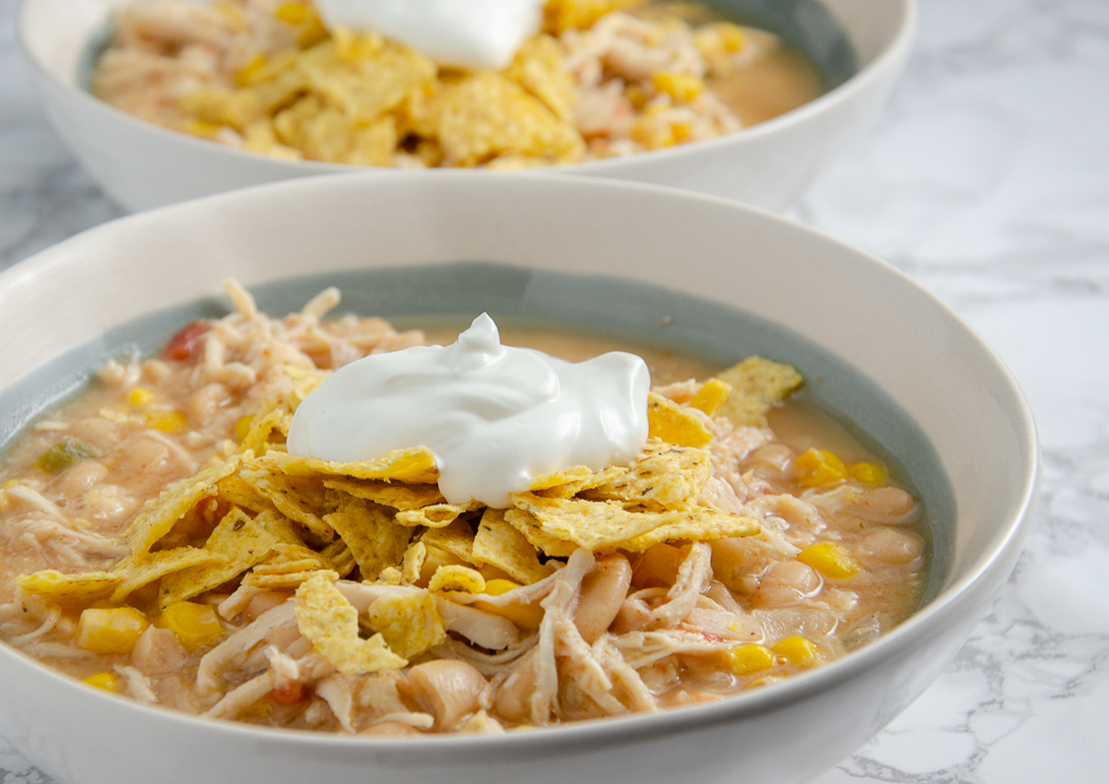 Slow Cooker White Chicken Chili. Delicious, easy white chicken chili. I always make a double batch and freeze half! Fabulous freezer meal.