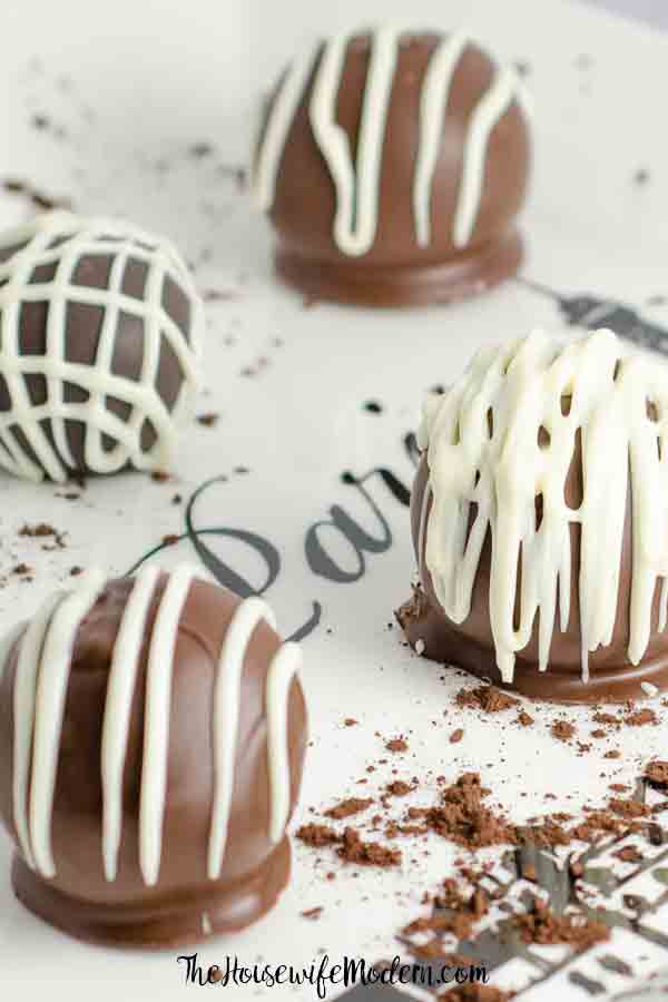 Devil's Food Cake Bites_Pin2 Luscious Devil's Food Cake Cake Bites. Devil’s food cake, special dark frosting, Ghirardelli chocolate wafers combine into bite-sized desserts. #chocolate #cake #cakebites #dessert #sweets