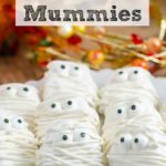 Pin image for Halloween mummies: white chocolate peanut butter crackers.