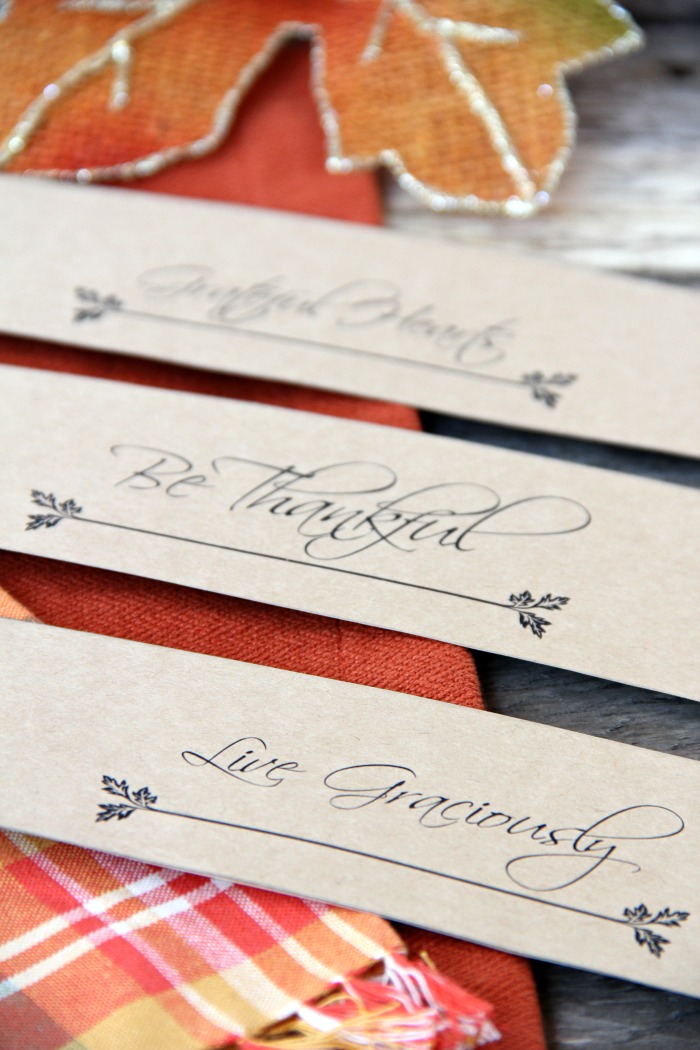 Thanksgiving-Napkin-Holders1-post Thanksgiving Napkin Holders. Part of Free Thanksgiving Printables Round-Up. Over 50 free Thanksgiving printables including decor, planners, labels, food decoration, and more! #thanksgiving #free #printable #freeprintable #thanksgivingprintable