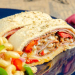 Homemade Stromboli- Like Your Favorite Pizzeria. Easy to make, loaded with 4 meats, 2 cheeses, & vegetables. Great for dinner or an appetizer. #stromboli #Italian #appetizer #dinner #homemade #fromscratch