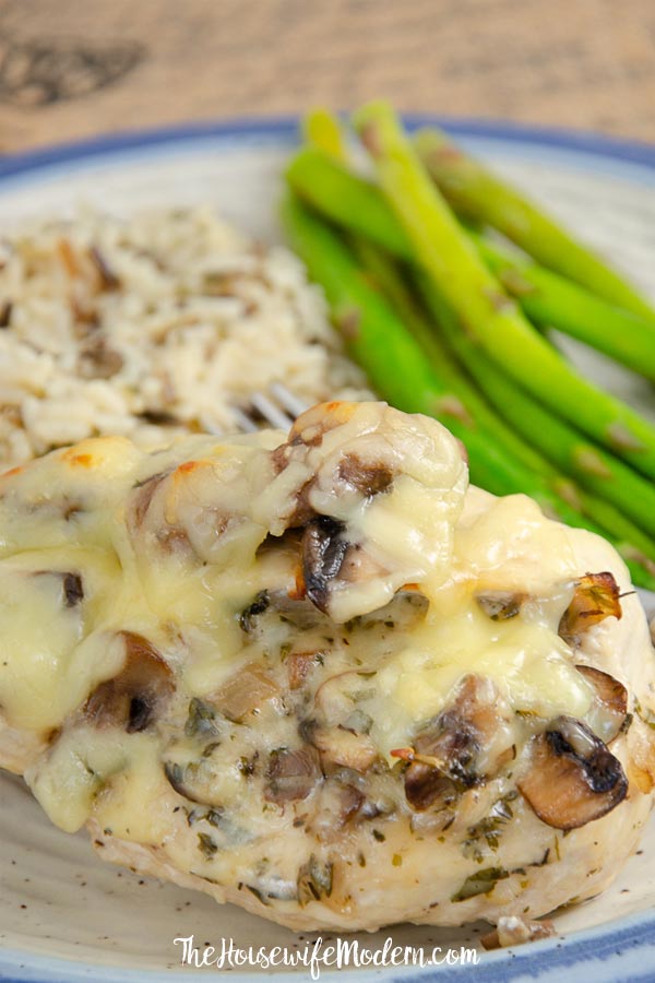 Gouda Mushroom Chicken_Pin2 Pin image- Close-up of gouda and mushroom stuffed chicken.