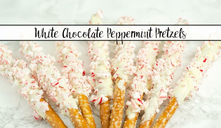 Featured image for white chocolate peppermint pretzels. Pretzels spread out over white marble with text.