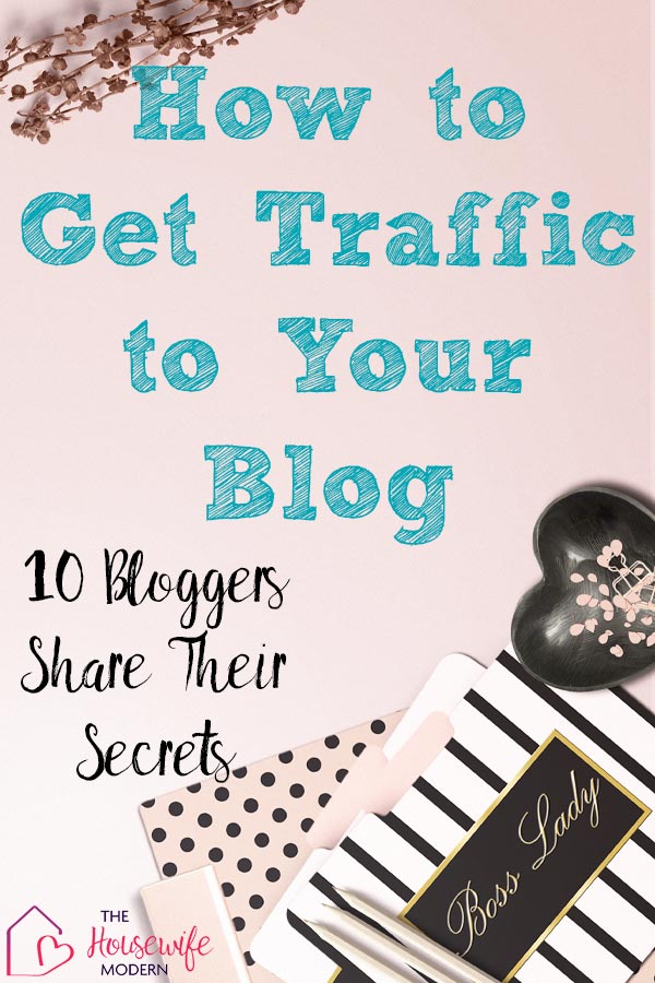 Pin image for how to get blog traffic. Pink desktop with text overlay.