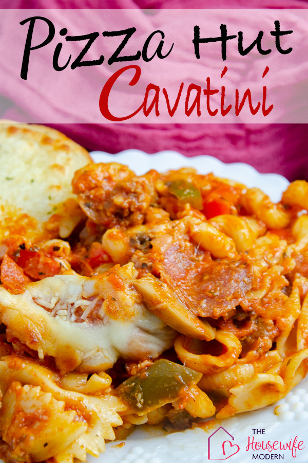 Pin image for copycat Pizza Hut Cavatini. White plate with garlic bread on side. Pink cloth in background.