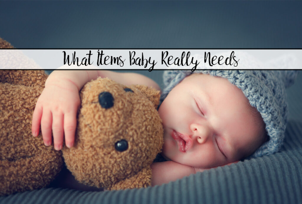 Featured image. Baby sleeping holding teddy bear with text overlay.