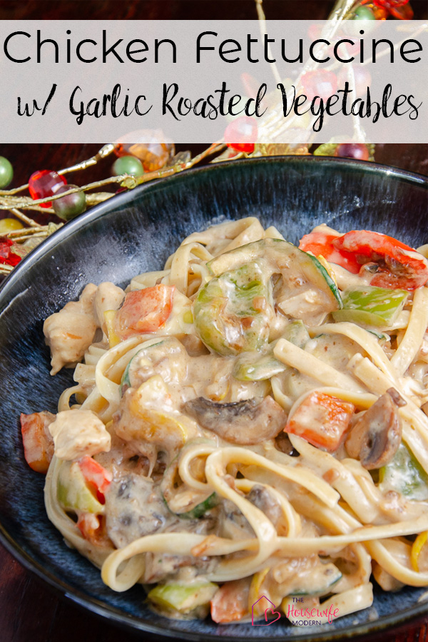 Pin image of chicken fettuccine with roasted vegetables. Close-up of pasta, chicken, and veggies in blue bowl.