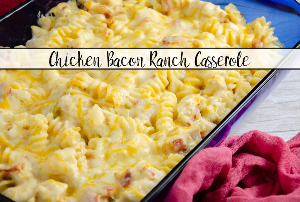 Featured image. Casserole in large blue casserole dish with red cheesecloth