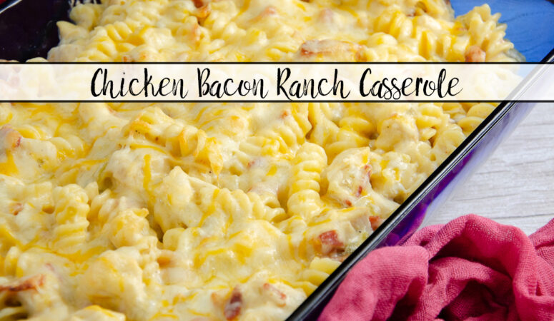 Featured image. Casserole in large blue casserole dish with red cheesecloth