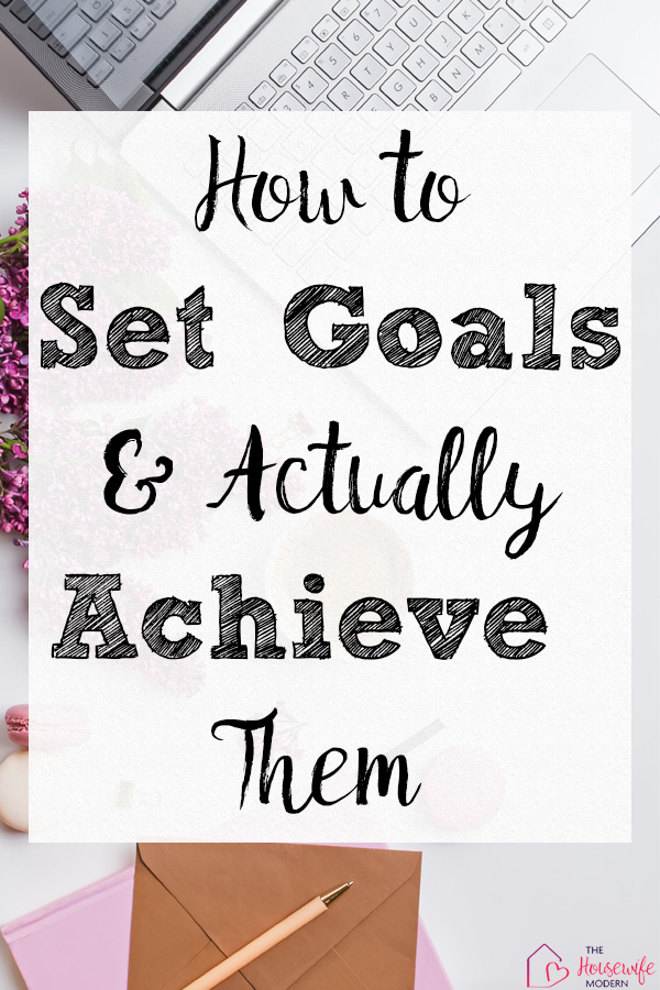 Pin image for how to set goals. Floral desk flatlay with text overlay.