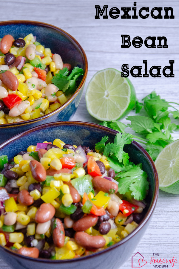Easy Mexican bean salad is packed with corn, three kinds of beans, colorful peppers, and cilantro tossed in a fresh lime dressing. This make ahead healthy side dish is perfect for summer BBQs, potlucks, picnics, and meal prep.