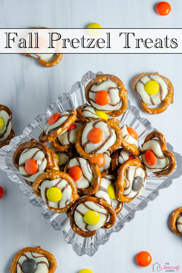 Looking for an easy fall treat? These sweet-and-salty pretzels are topped with striped Hershey's Kisses and Reese’s Pieces for a colorful autumn snack. These easy fall pretzel treats are perfect for parties, after-school snacks, or a simple Thanksgiving treat.