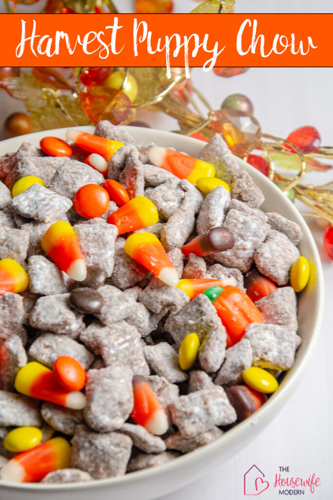 Make this easy Harvest Puppy Chow for a sweet and crunchy autumn treat! Chocolate peanut butter Chex, Reese’s Pieces, candy corn, harvest candy corn, and candy pumpkins make a colorful snack that’s perfect for fall parties or Thanksgiving gatherings.