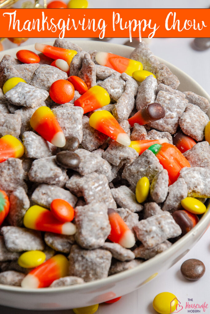 This easy Thanksgiving Puppy Chow is a fun sweet treat for the holiday! Classic chocolate peanut butter puppy chow is loaded with Reese’s Pieces, candy corn, harvest candy corn, and candy pumpkins. Serve it at a Thanksgiving party, add it to your dessert table, or package it up for an easy Thanksgiving treat.
