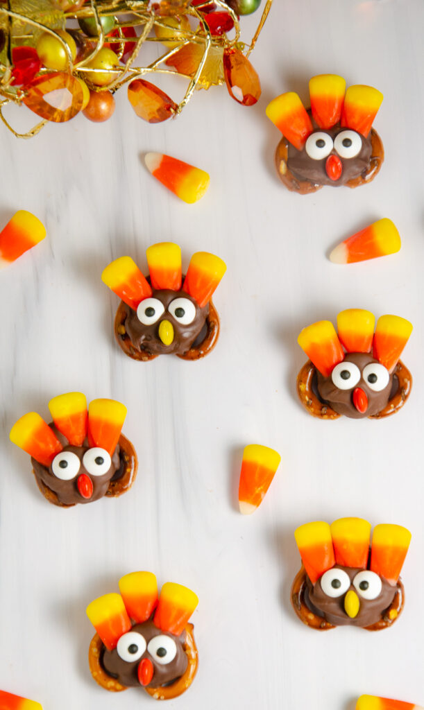 These Rolo Turkey Pretzels are an easy Thanksgiving treat made with pretzels, Rolos, candy corn, and candy eyes. These cute pretzel turkeys are simple to make and perfect for a fun Thanksgiving dessert or treat.