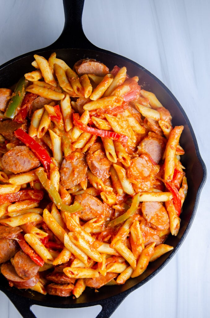This easy kielbasa pasta recipe is a simple meal packed with smoked sausage, penne, bell peppers, and onions in a flavorful tomato sauce. If you’re looking for a quick pasta recipe with kielbasa sausage, this hearty weeknight dinner is easy to make and full of flavor.
